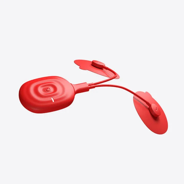 Red muscle vibration therapy device the PowerDot Uno showing a pod with the placement pads against a white background.